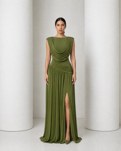 Model in the olive Thora gown, draped cowl neckline, ruched waist and gathered floor-length skirt