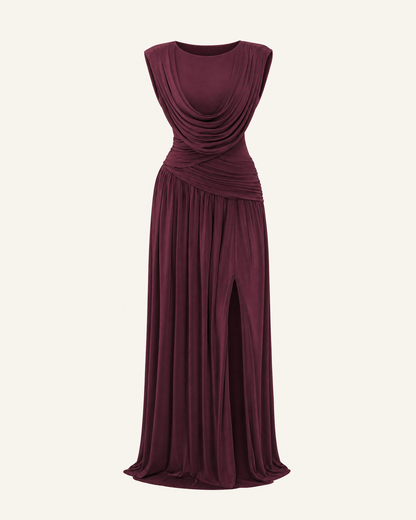 The Thora convertible cowl gown in wine red, shown alone against a bone background, full length