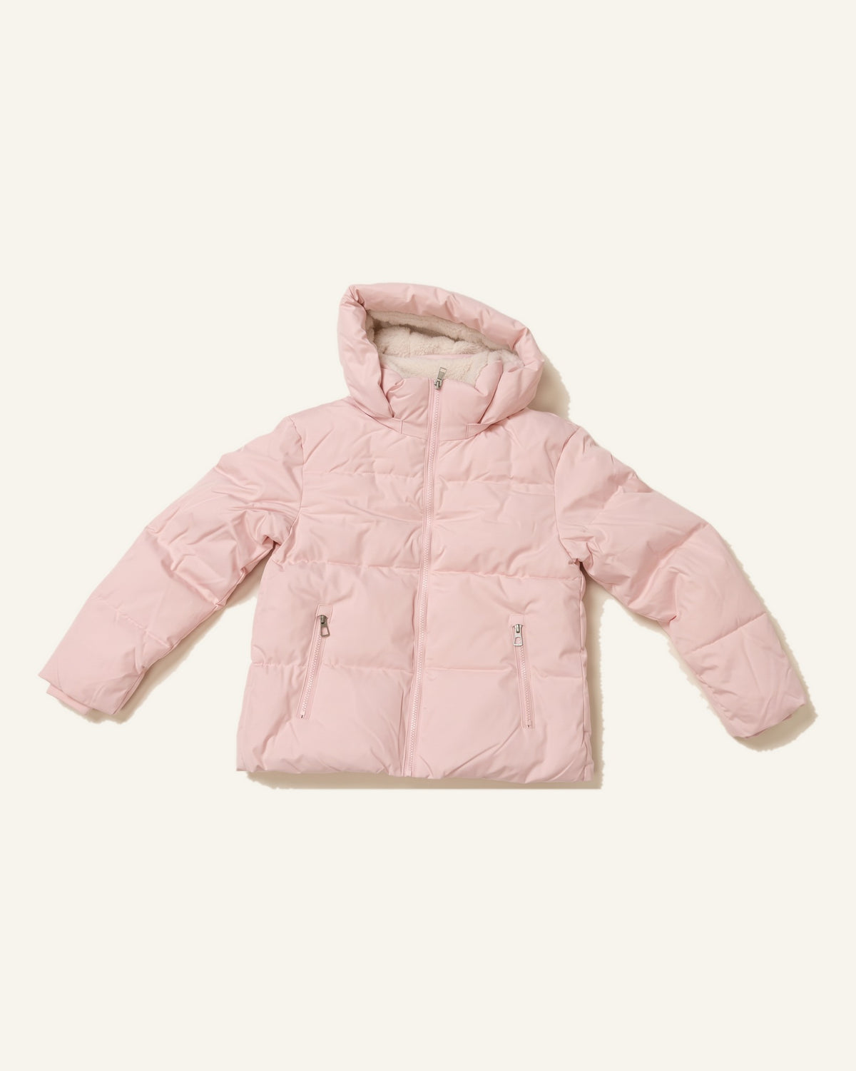 Tove pink hooded puffer jacket laid flat, quilted channels and two zip pockets