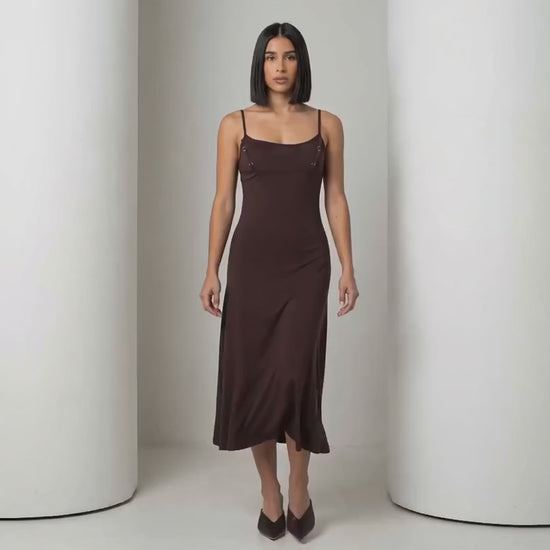 Short clip of the Siv espresso midi slip dress walking and turning to show the back